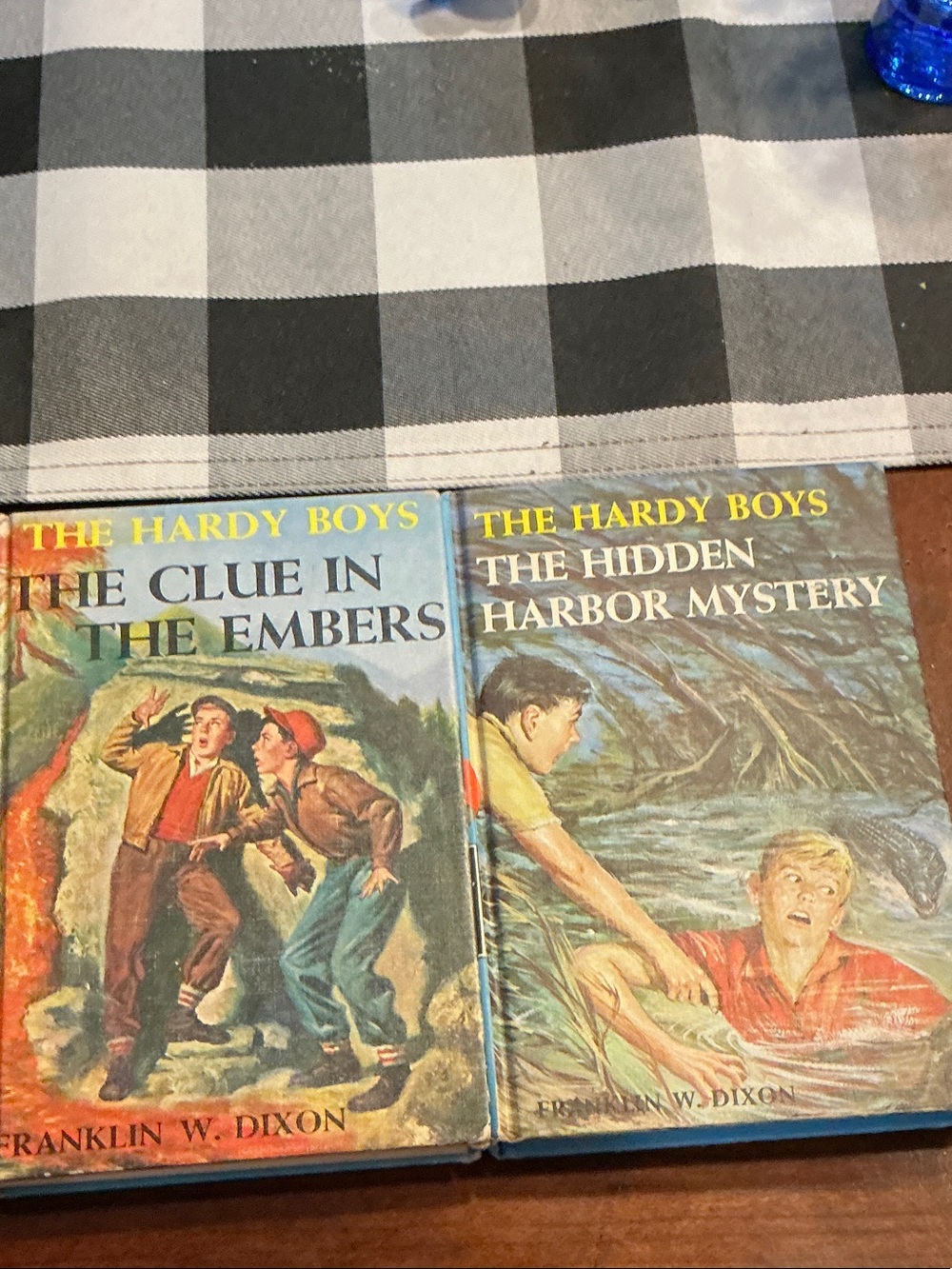 Two vintage Hardy boys books-The Clue in the Embers  + Hidden Harbor Mystery.